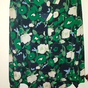 Green floral blouse.